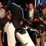 Tesla made quite the splash at the recent Cybercab event by showcasing its humanoid Optimus robots alongside the introduction of the new Tesla Robovan vehicle. The Optimus robots were seen walking out - Digital concept art for illustrative purpose, tags: version 3 soll 2026 - Monok