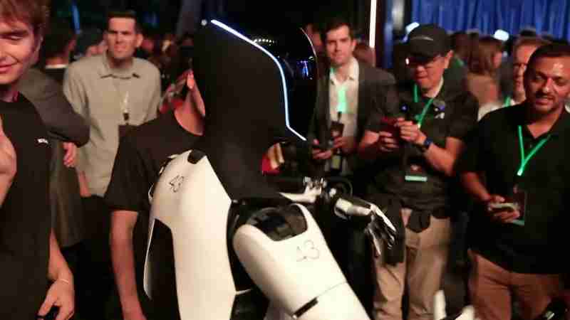 Tesla made quite the splash at the recent Cybercab event by showcasing its humanoid Optimus robots alongside the introduction of the new Tesla Robovan vehicle. The Optimus robots were seen walking out - Digital concept art for illustrative purpose, tags: version 3 soll 2026 - Monok